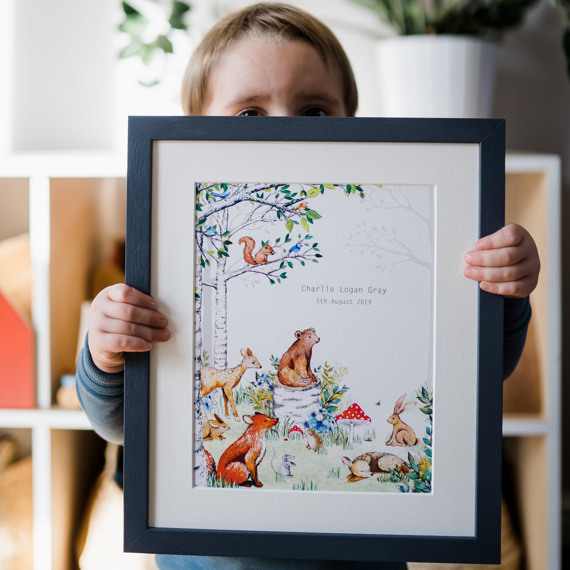 A Personalised Woodland Animals Nursery Print hand painted and illustrated by Charlotte Jones Design.  